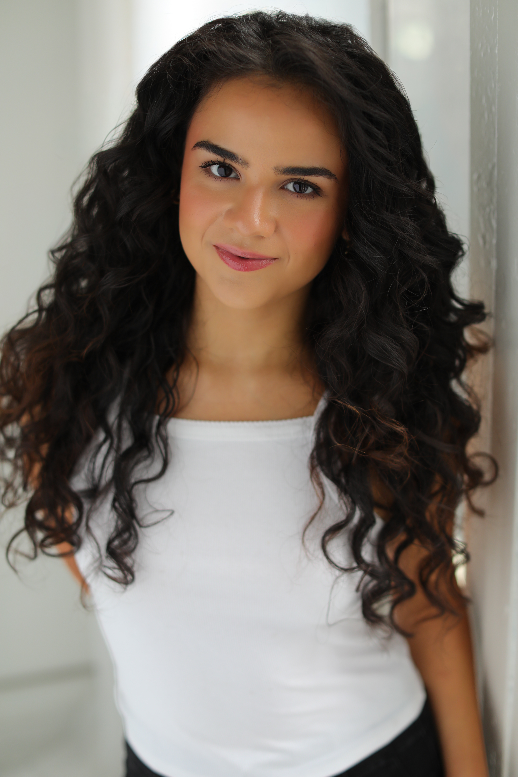 Sophia Ruiz in a white top